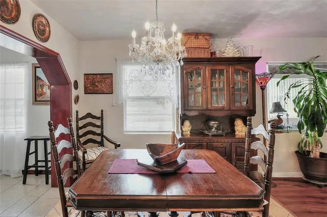 a kitchen with a sink stove and refrigerator