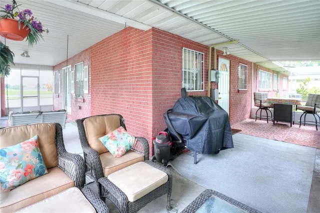 a outdoor living space with furniture and garden view