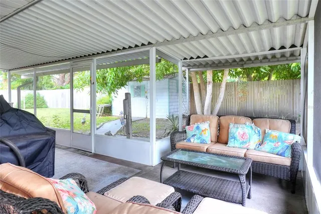 a outdoor living space with furniture and a garden