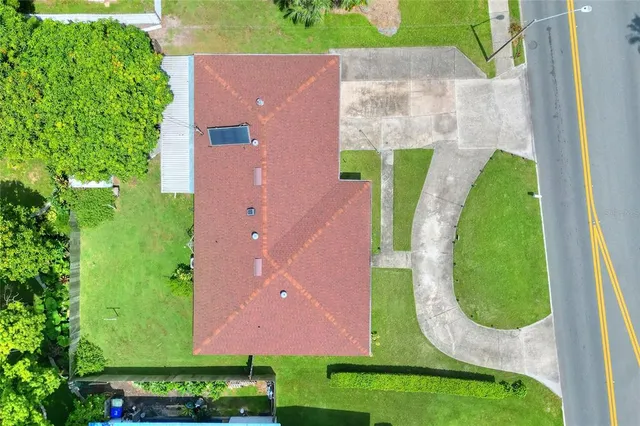 a bedroom with a bed and a chair