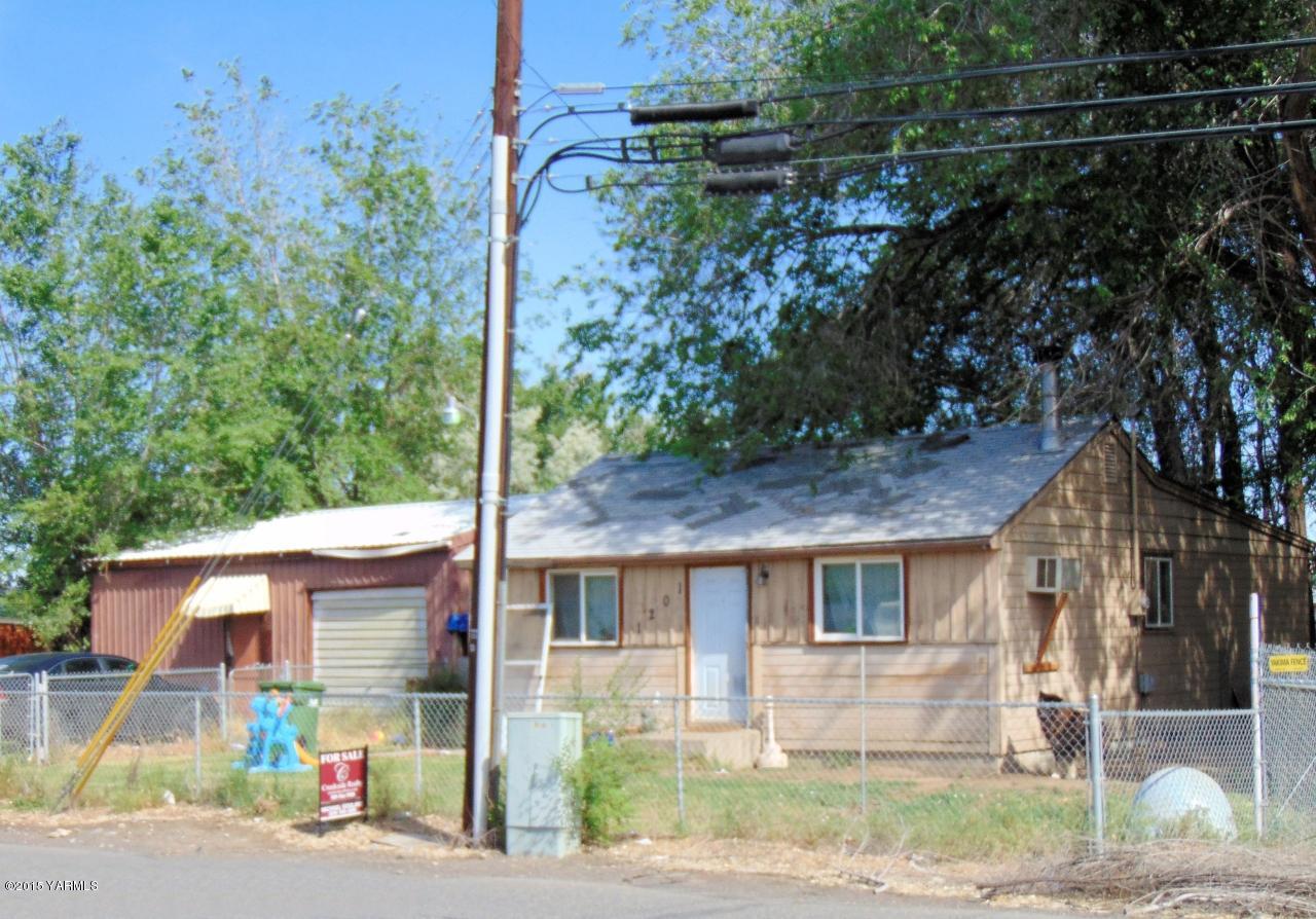 a view of a house with a street