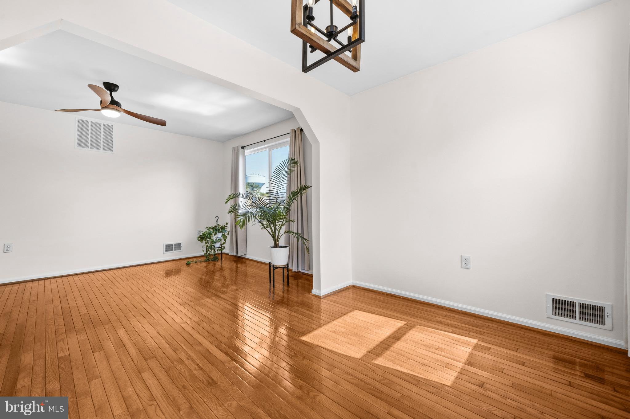 5 Coatbridge Court Olney, MD 20832 - Photo 11 of 49 a view of empty room with wooden floor and fan