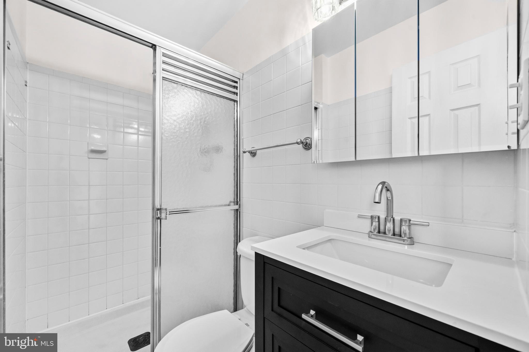 5 Coatbridge Court Olney, MD 20832 - Photo 20 of 49 a bathroom with a sink and a mirror