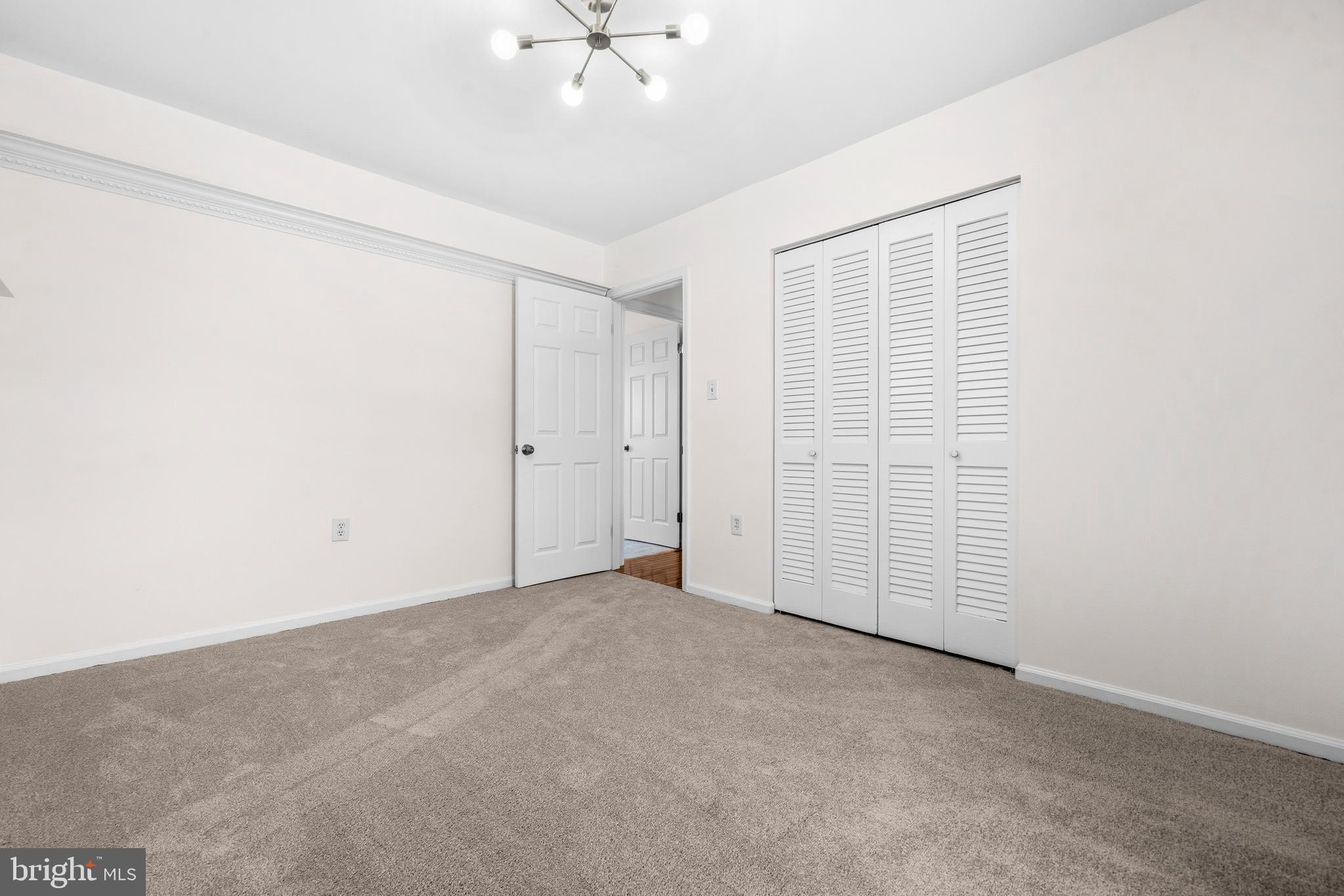 5 Coatbridge Court Olney, MD 20832 - Photo 22 of 49 an empty room with chandelier fan