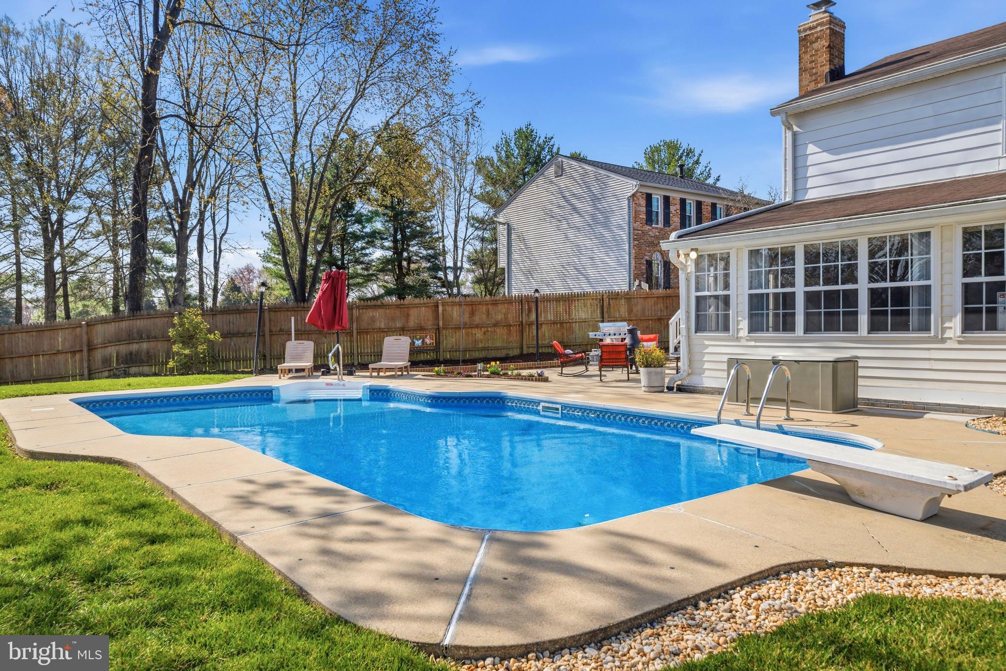 5 Coatbridge Court Olney, MD 20832 - Photo 40 of 49 a view of a house with swimming pool and sitting area