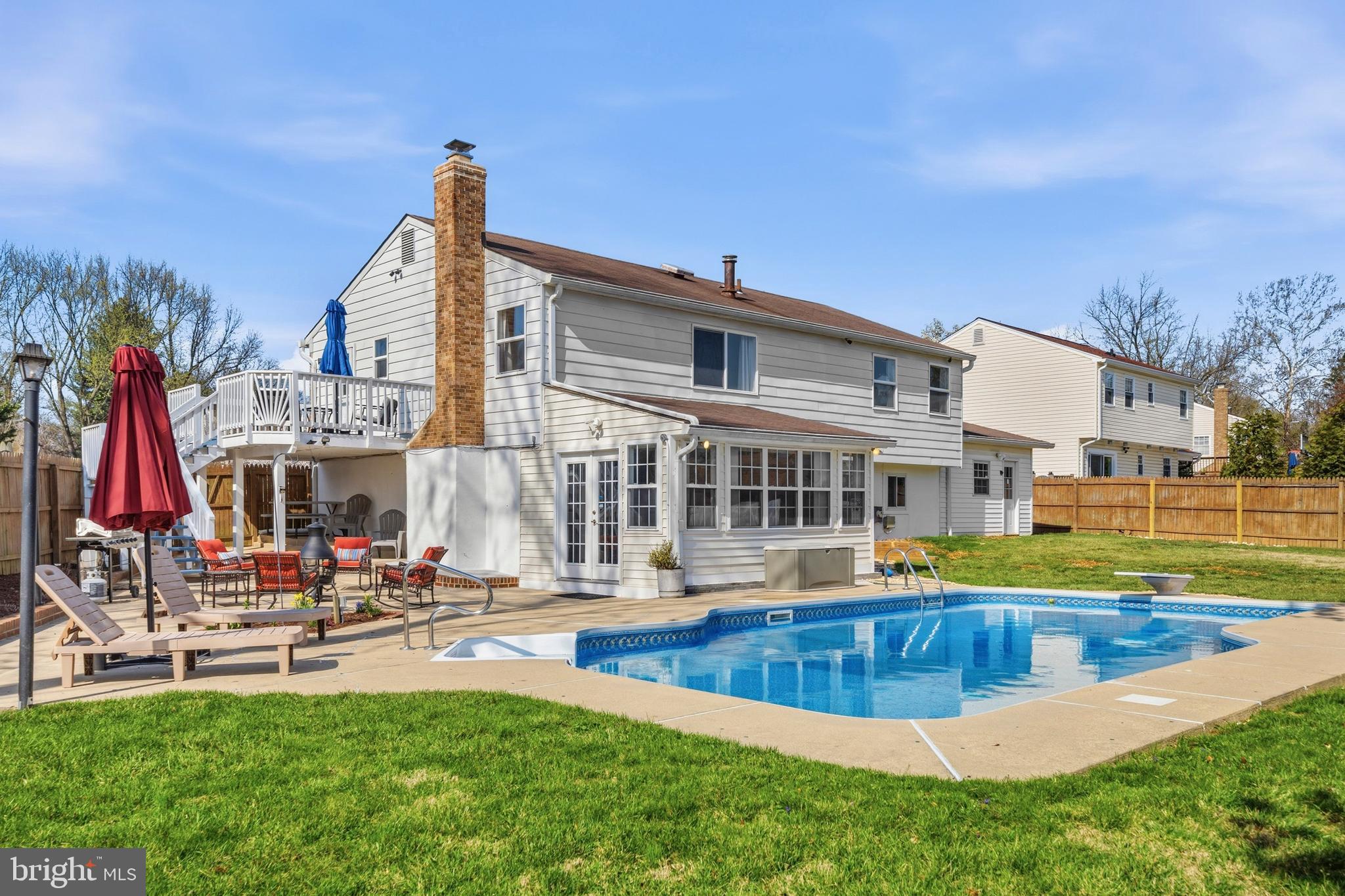 5 Coatbridge Court Olney, MD 20832 - Photo 43 of 49 a view of a house with swimming pool and sitting area