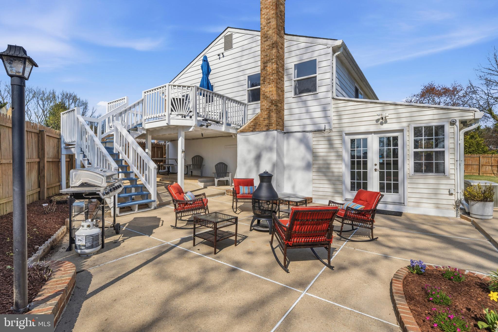 5 Coatbridge Court Olney, MD 20832 - Photo 45 of 49 a building outdoor space with patio furniture and potted plants