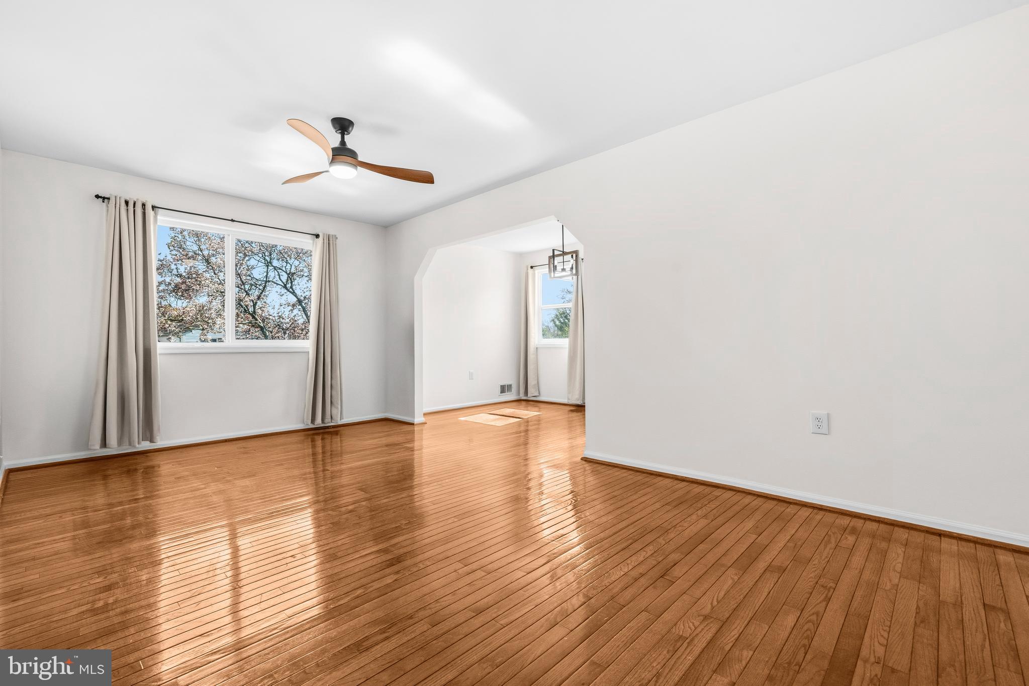 5 Coatbridge Court Olney, MD 20832 - Photo 5 of 49 a view of empty room with wooden floor and fan