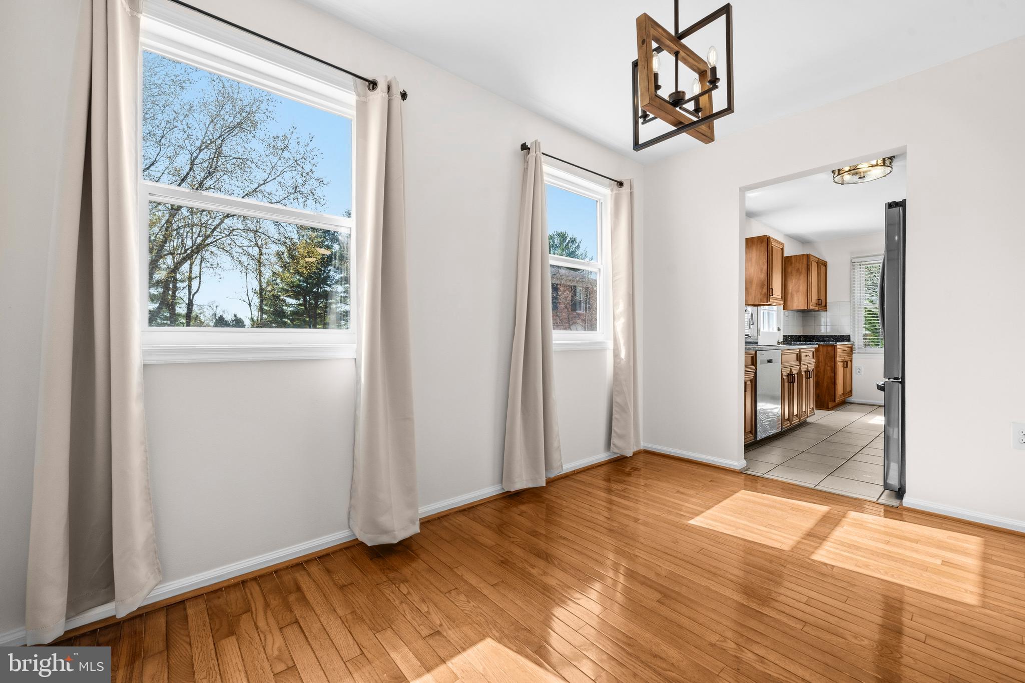 5 Coatbridge Court Olney, MD 20832 - Photo 10 of 49 a view of a room with wooden floor and a window