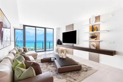 a bedroom with a bed and a view of bathroom