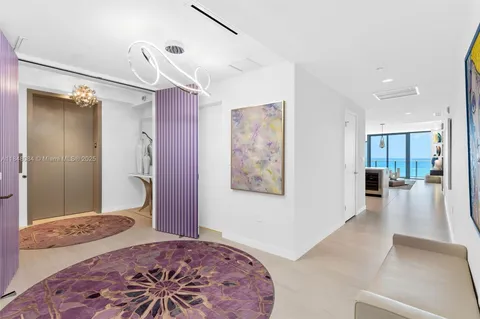 a bathroom with a double vanity sink mirror and shower