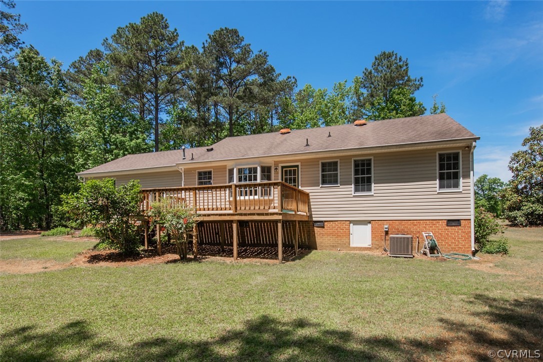 21417 Courthouse Road Dinwiddie, VA 23841 - Photo 47 of 50 a front view of a house with a garden
