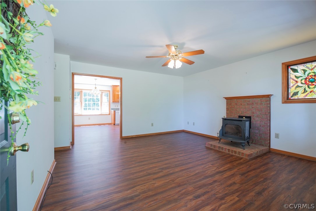 21417 Courthouse Road Dinwiddie, VA 23841 - Photo 6 of 50 an empty room with wooden floor and windows