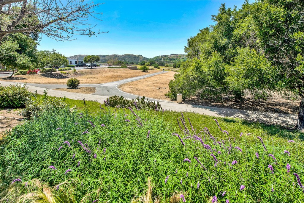 68 Abrigo Rancho Santa Margarita, CA 92688 - Photo 36 of 70 a view of an outdoor space and a yard