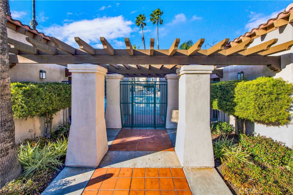 68 Abrigo Rancho Santa Margarita, CA 92688 - Photo 37 of 70 a view of a patio with table and chairs potted plants