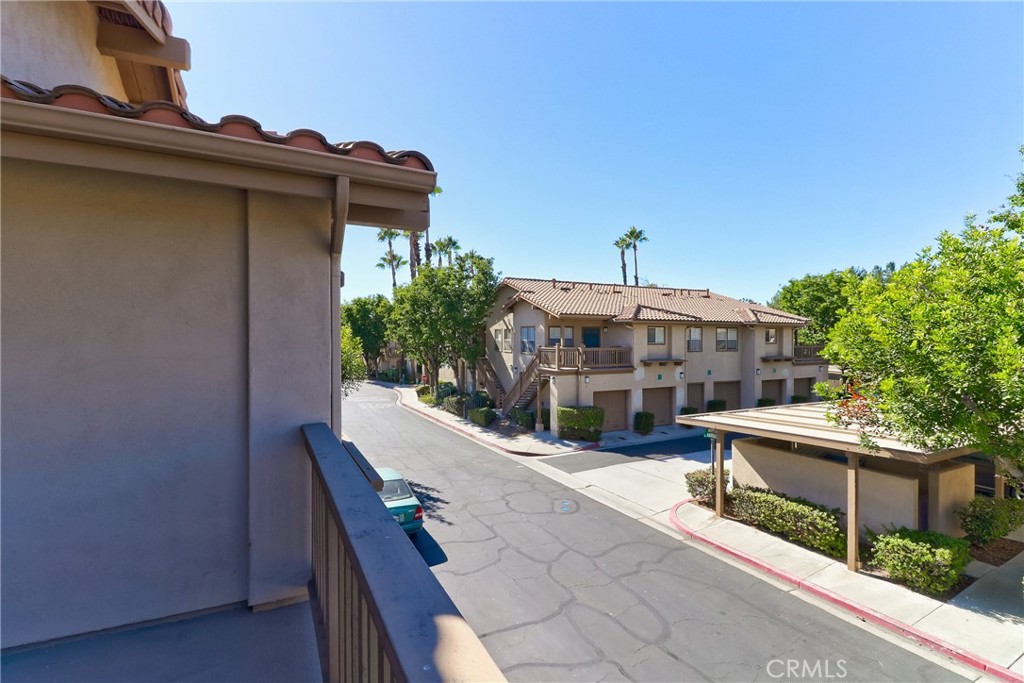 68 Abrigo Rancho Santa Margarita, CA 92688 - Photo 8 of 70 a roof deck with a potted plant on the side