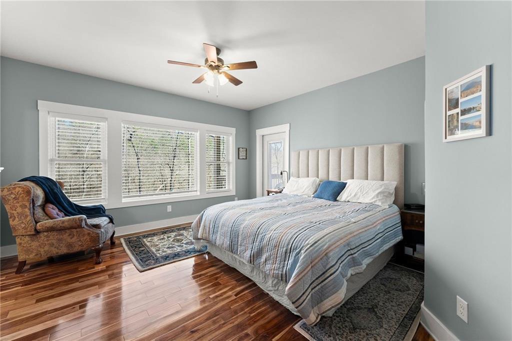 434 Riverbend Lane Bogart, GA 30622 - Photo 17 of 62 a bedroom with a large bed and a couch