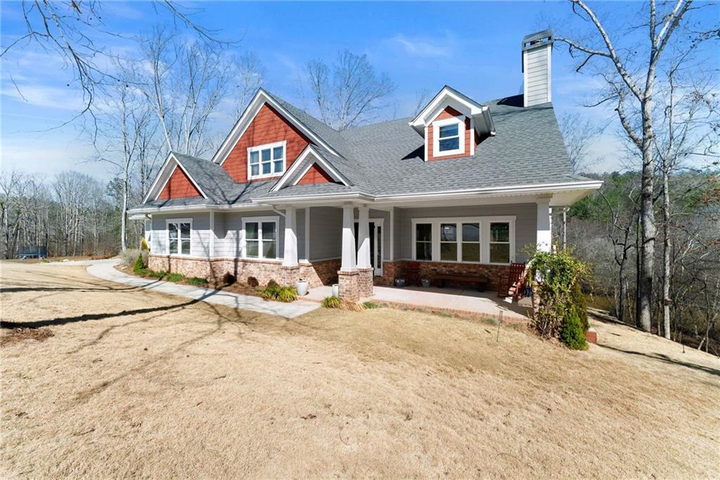 434 Riverbend Lane Bogart, GA 30622 - Photo 2 of 62 a front view of a house with yard and porch