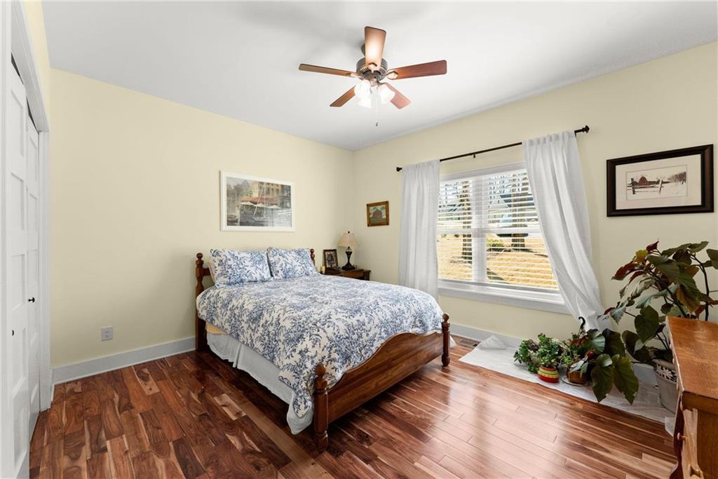 434 Riverbend Lane Bogart, GA 30622 - Photo 28 of 62 a bedroom with a bed and a large window