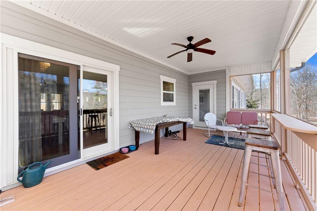 434 Riverbend Lane Bogart, GA 30622 - Photo 61 of 62 a living room with furniture and a wooden floor