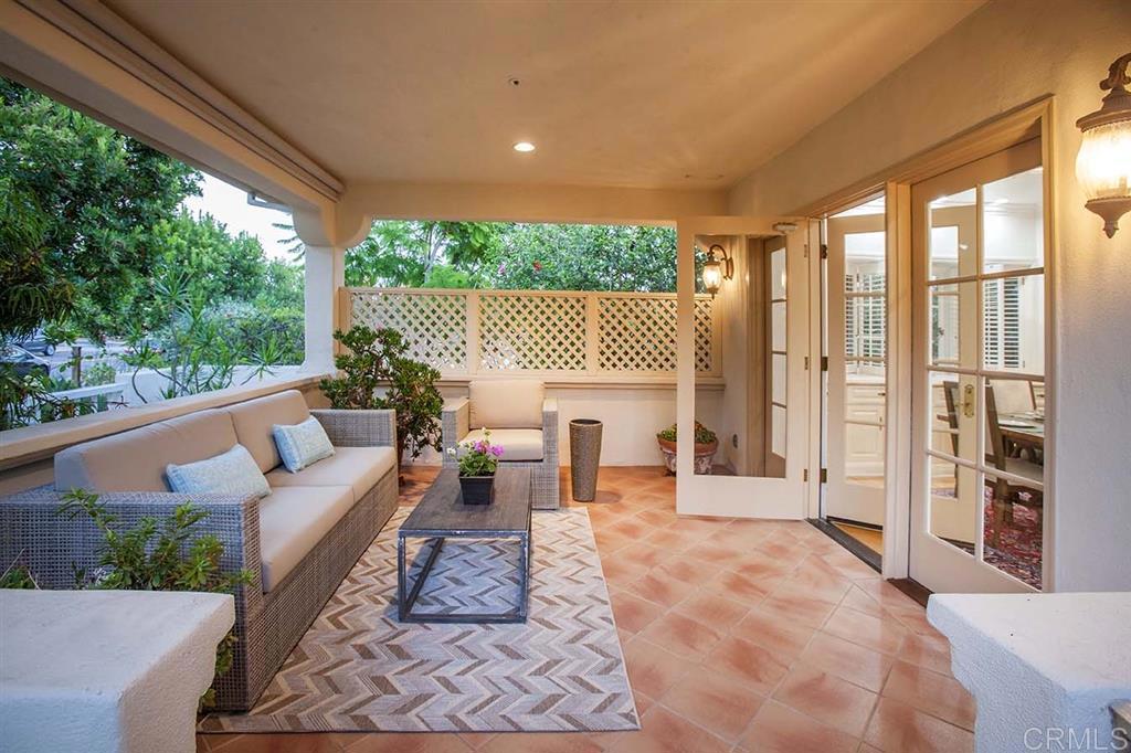 6019 La Flecha Rancho Santa Fe, CA 92067 - Photo 19 of 25 a outdoor living space with furniture and a floor to ceiling window