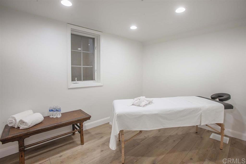 6019 La Flecha Rancho Santa Fe, CA 92067 - Photo 22 of 25 a bedroom with a bed and a table in it