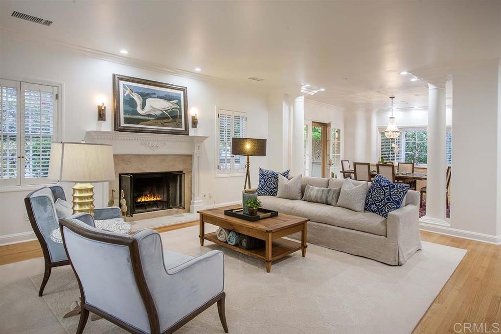6019 La Flecha Rancho Santa Fe, CA 92067 - Photo 6 of 25 a living room with furniture and a fireplace