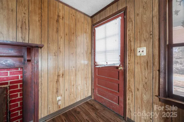 a view of an empty room and window