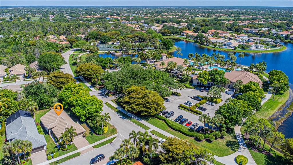 1364 Triandra Lane Naples, FL 34119 - Photo 13 of 27 an aerial view of residential houses with outdoor space
