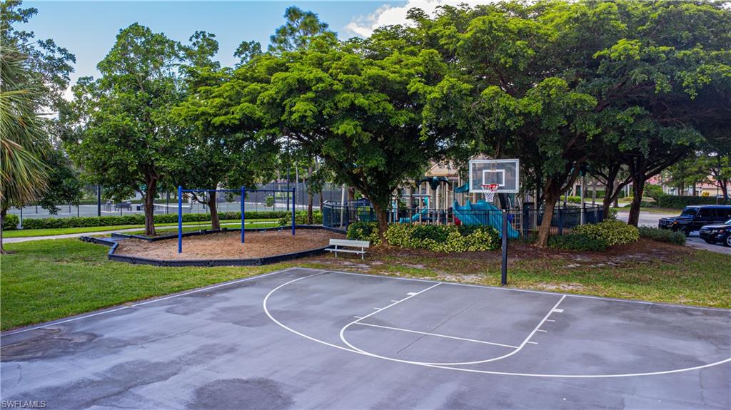1364 Triandra Lane Naples, FL 34119 - Photo 25 of 27 a view of a playground with basketball court