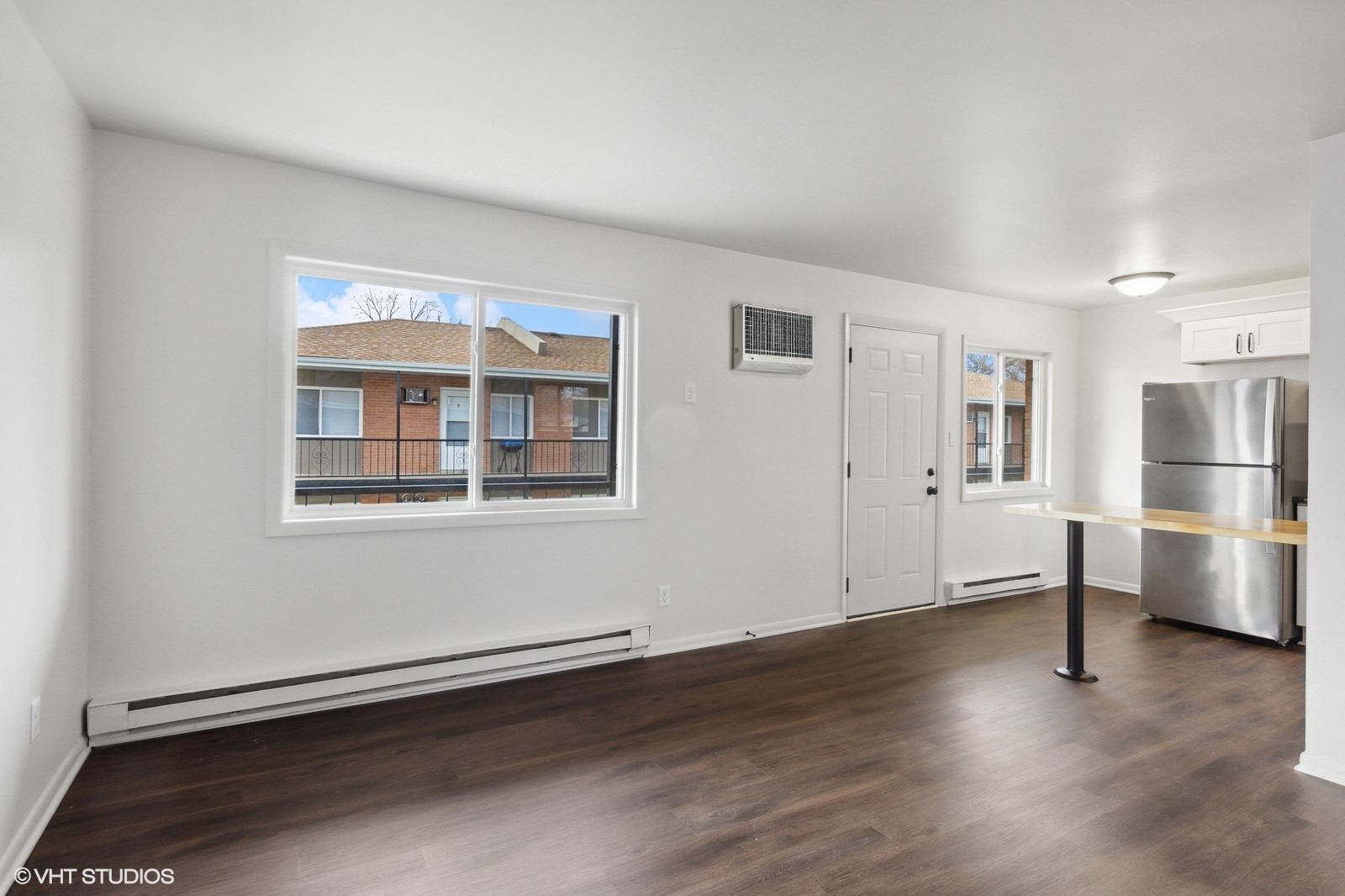 755 South Nelson Avenue, Unit 7 Kankakee, IL 60901 - Photo 3 of 9 a view of kitchen with furniture and refrigerator