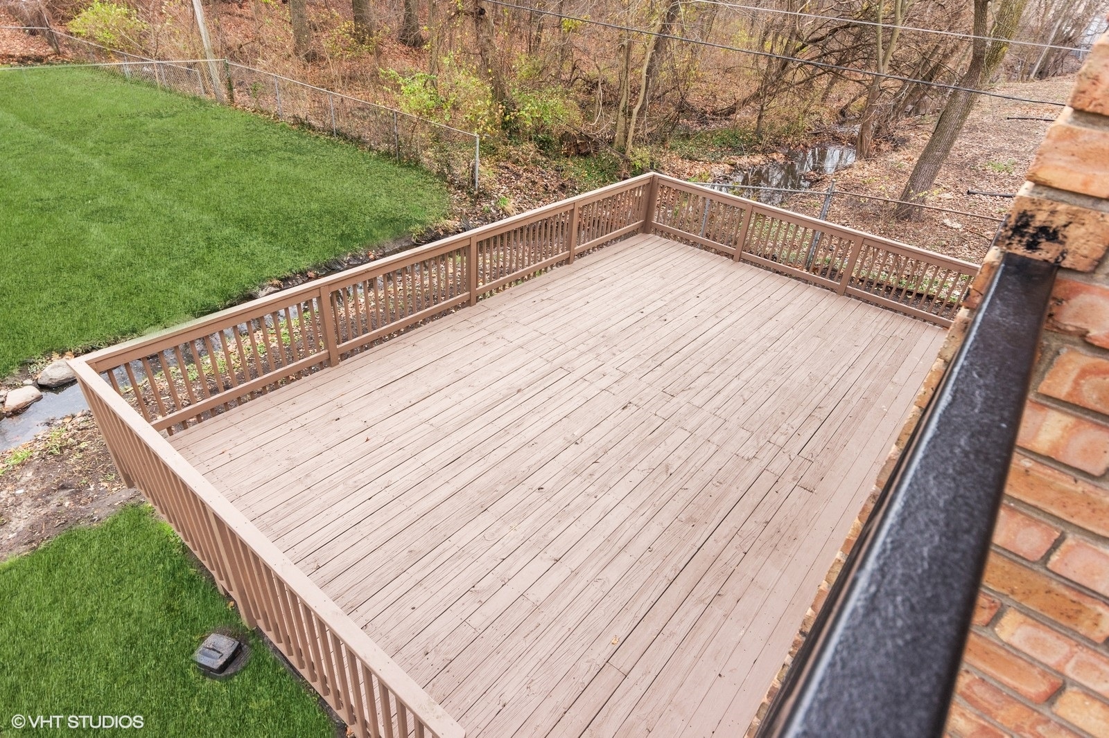 755 South Nelson Avenue, Unit 7 Kankakee, IL 60901 - Photo 9 of 9 a view of balcony with wooden floor