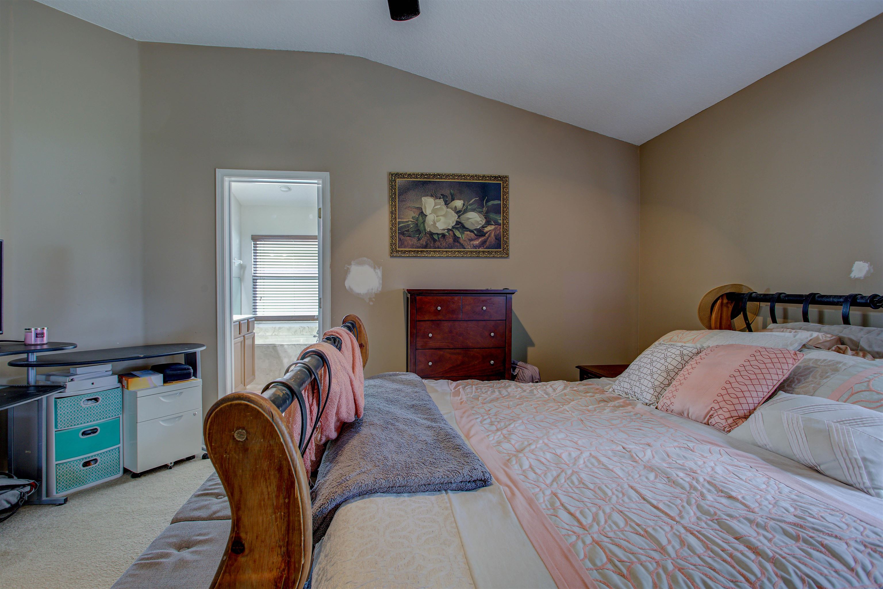 939 Silver Spring Court St. Augustine, FL 32092 - Photo 49 of 79 a bedroom with a bed chair and a window