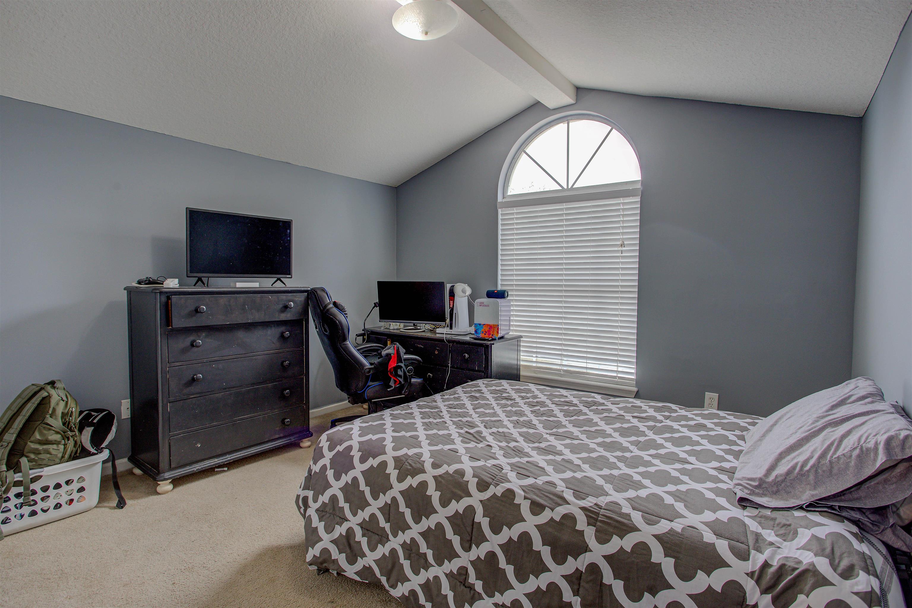 939 Silver Spring Court St. Augustine, FL 32092 - Photo 55 of 79 a bedroom with a bed and a television