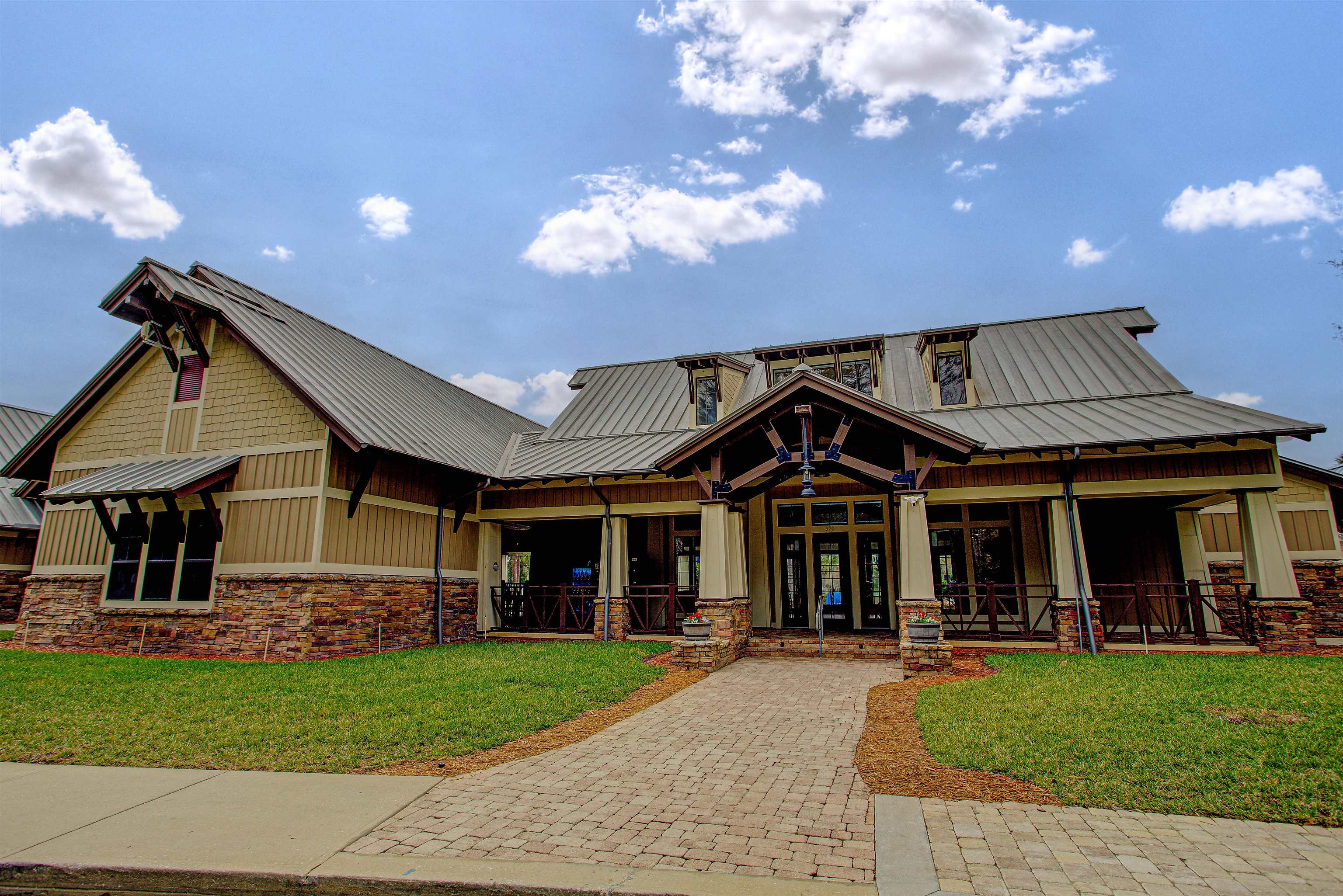 939 Silver Spring Court St. Augustine, FL 32092 - Photo 64 of 79 a front view of a house with a yard table and chairs
