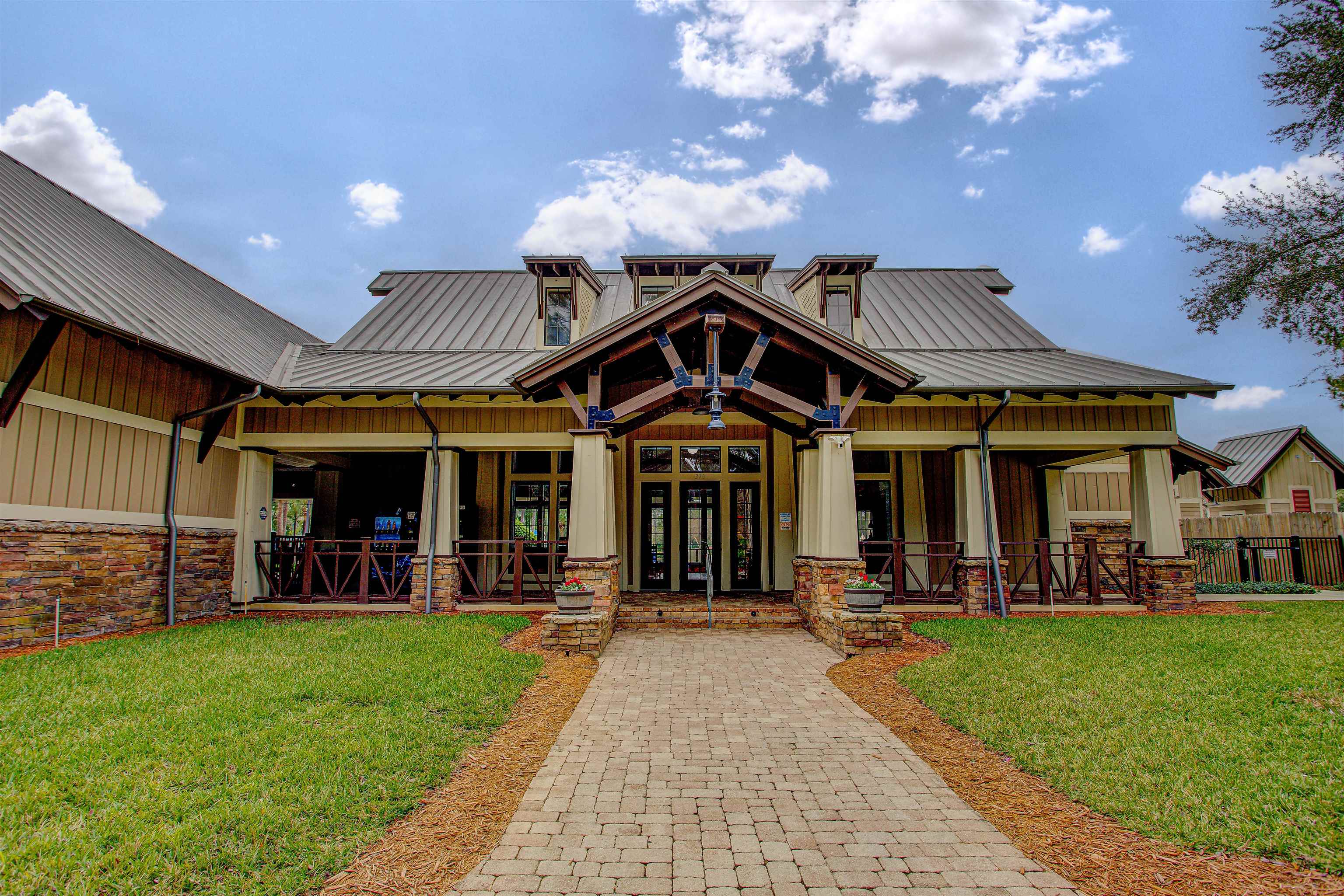 939 Silver Spring Court St. Augustine, FL 32092 - Photo 65 of 79 a view of a house with a small yard and a large tree