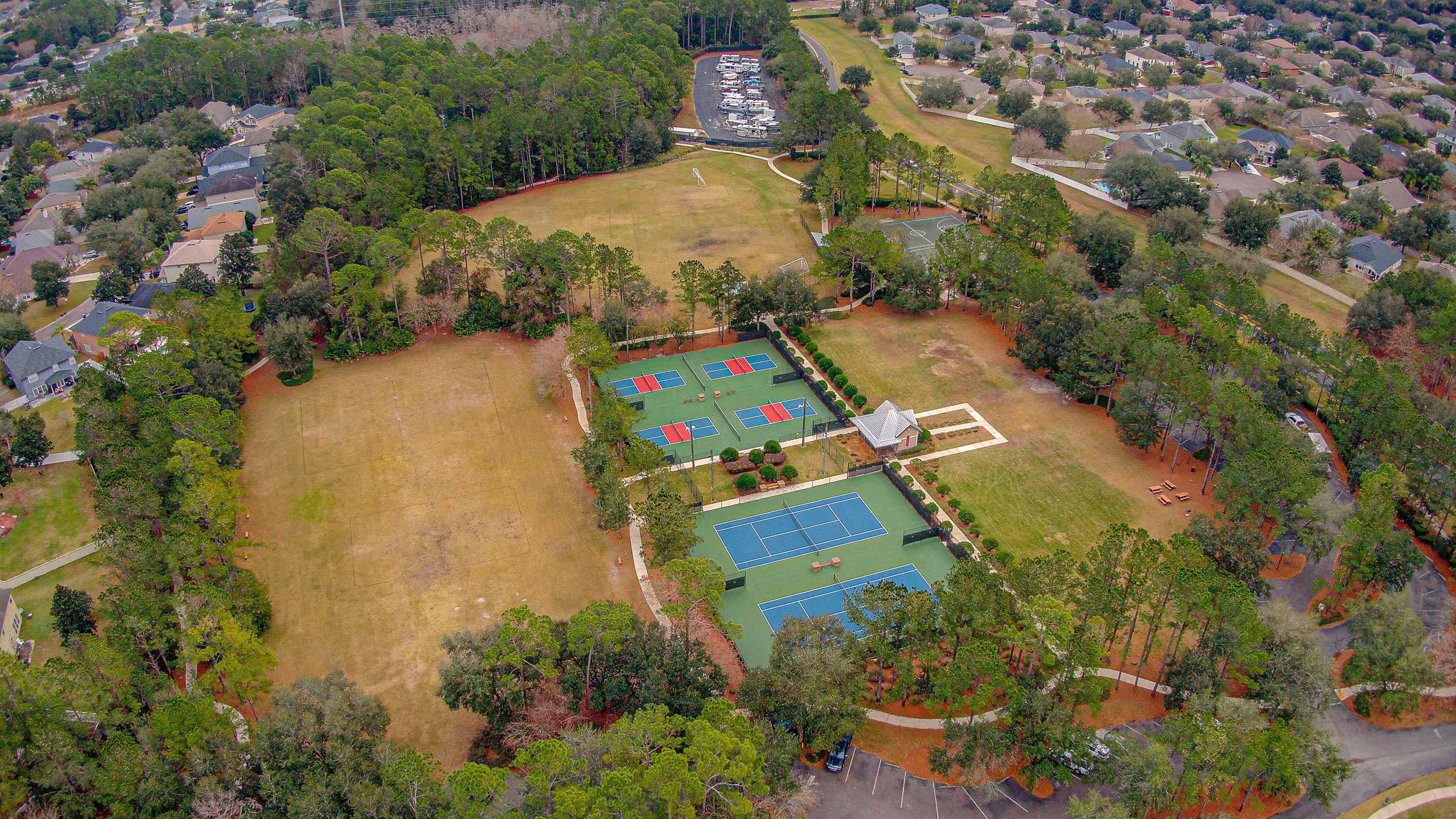 939 Silver Spring Court St. Augustine, FL 32092 - Photo 76 of 79 an aerial view of a house with a yard and lake view