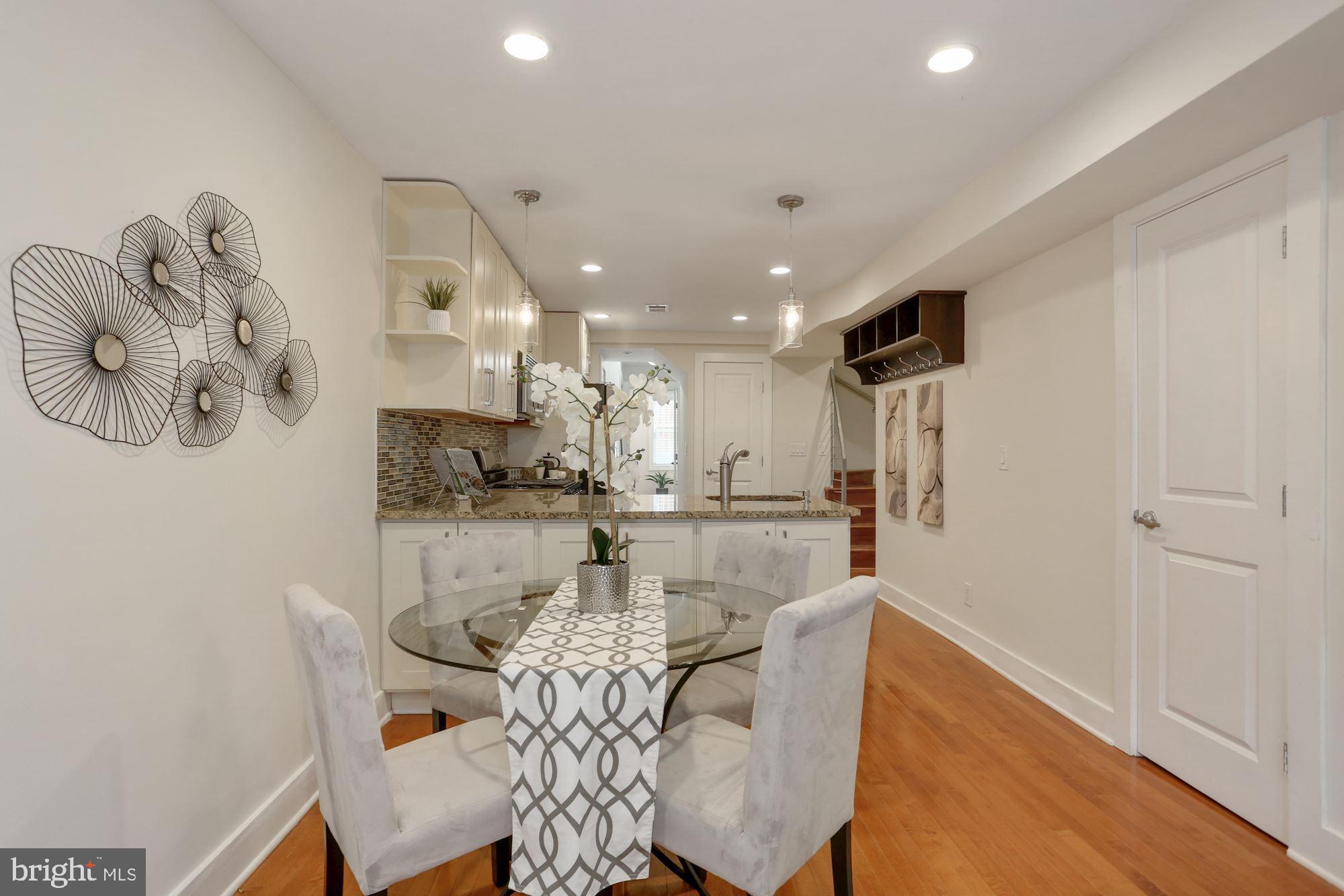 43 Hanover Place Northwest, Unit 1 Washington, DC 20001 - Photo 8 of 23 a view of a dining room with furniture