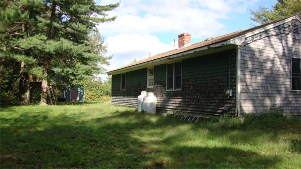 22 Mendall Road Acushnet, MA 02743 - Photo 2 of 14 a front view of a house with garden