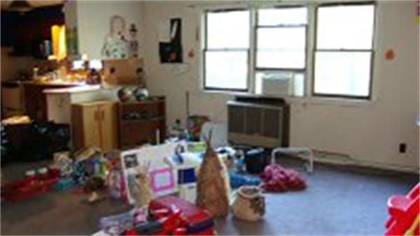 22 Mendall Road Acushnet, MA 02743 - Photo 10 of 14 a room with furniture a flat screen tv and a window