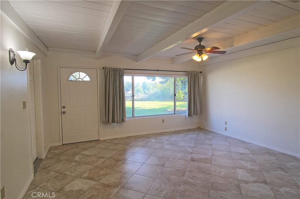 1235 Ruby Lane Calimesa, CA 92320 - Photo 7 of 17 a view of an empty room with a window