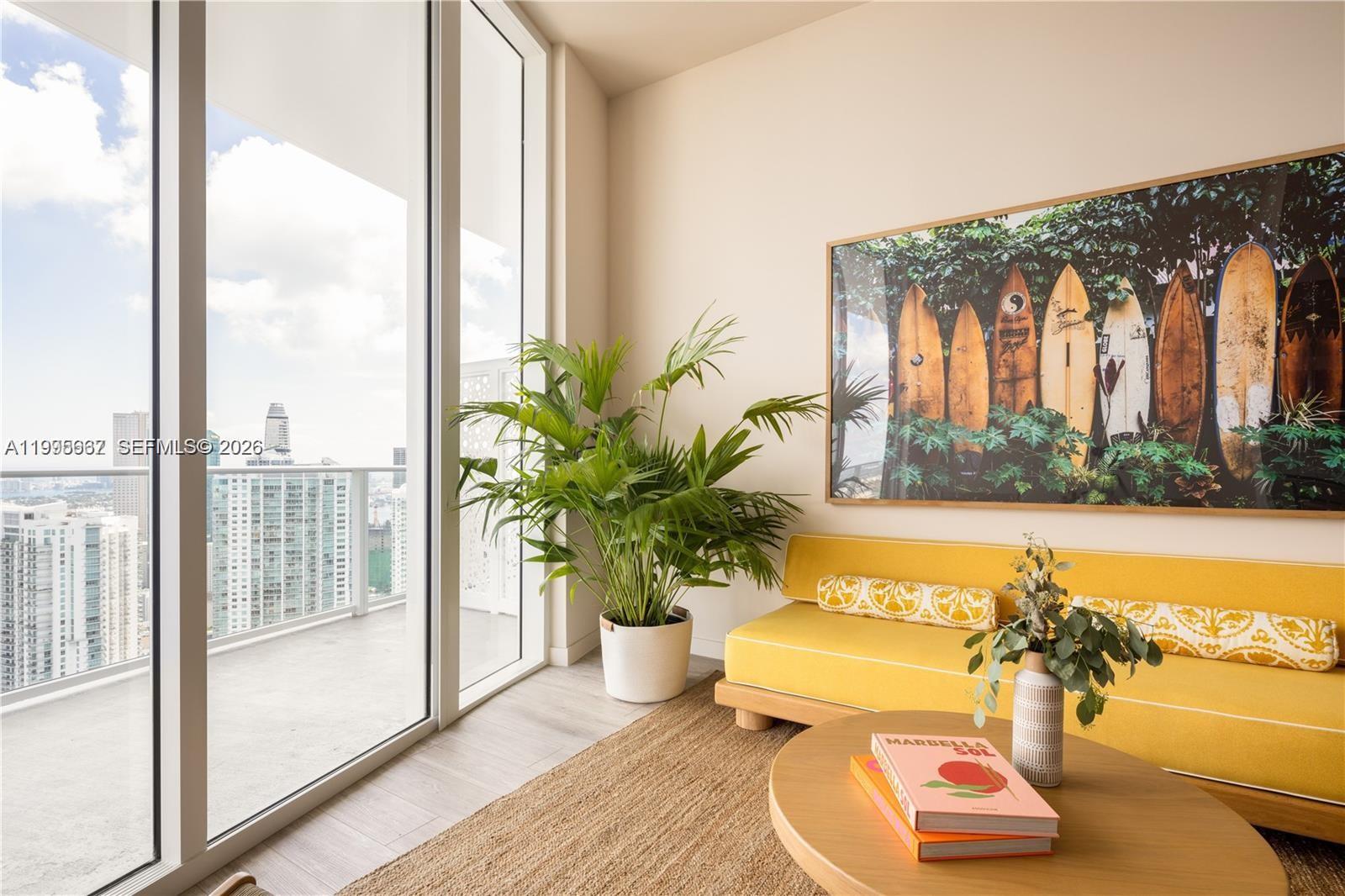 275 Southwest 6th Street, Unit 1110 Miami, FL 33130 - Photo 3 of 22 a view of a swimming pool with a lounge chair