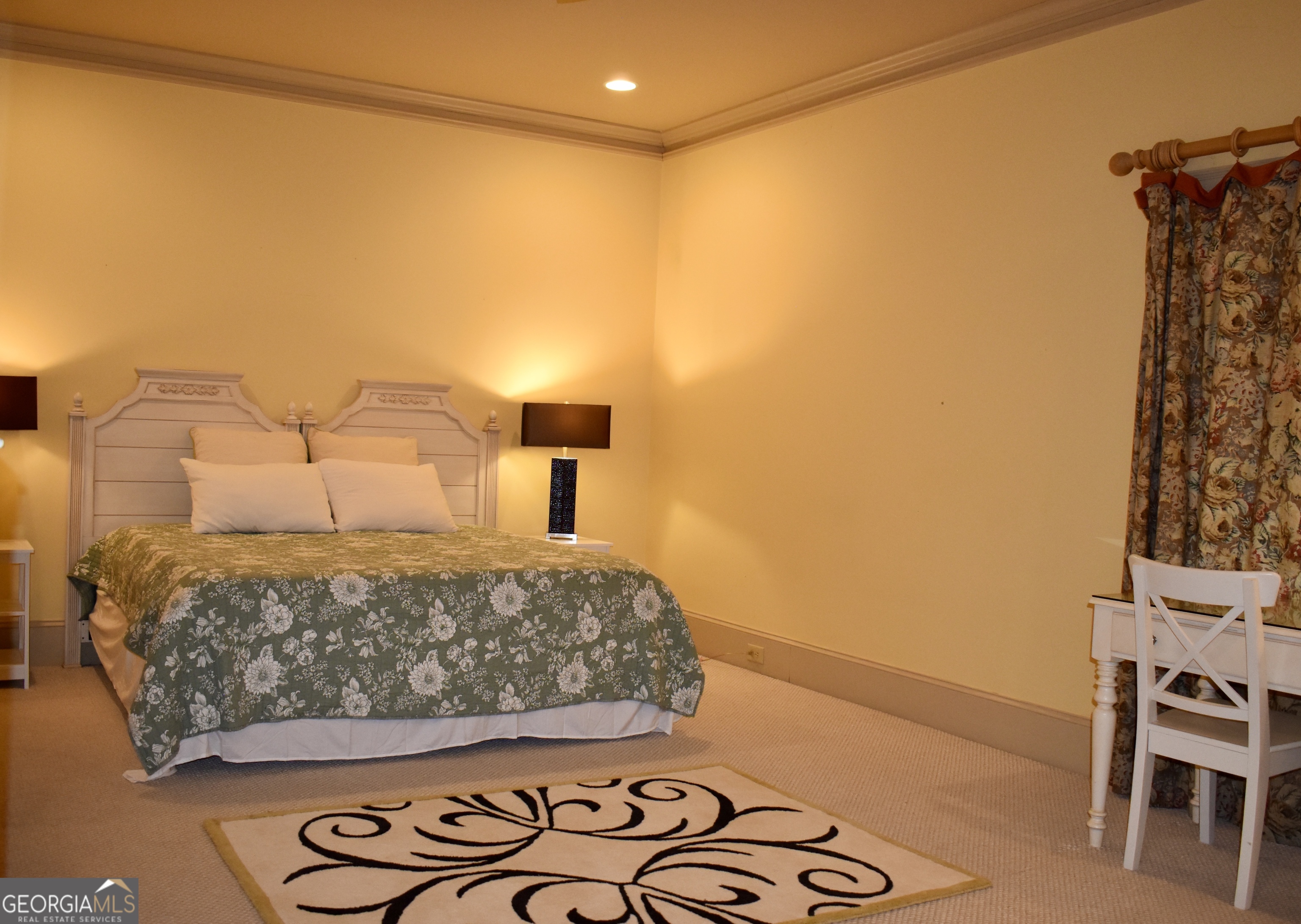 3 Club Drive Newnan, GA 30263 - Photo 15 of 43 a bedroom with a bed and a table in it