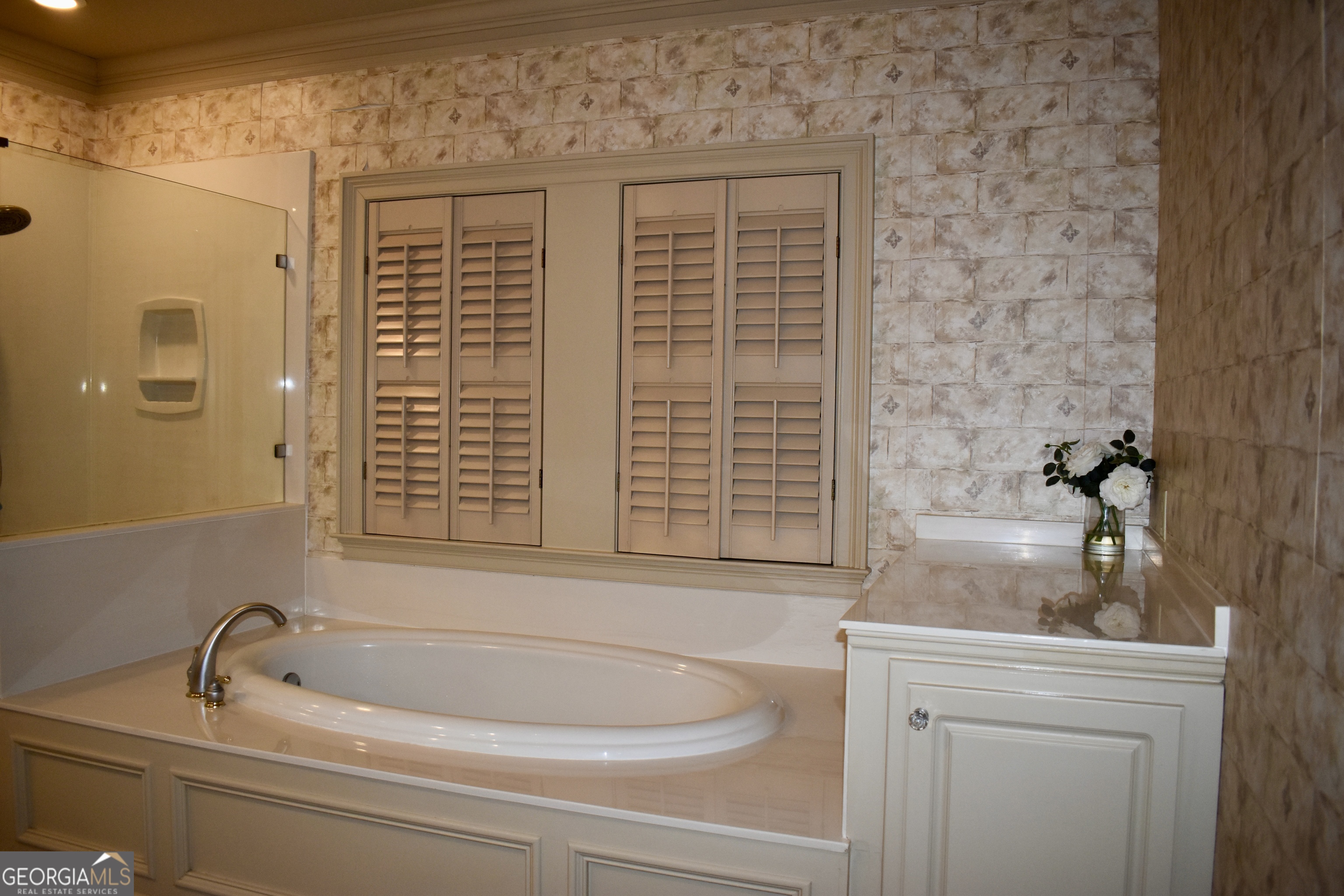 3 Club Drive Newnan, GA 30263 - Photo 22 of 43 a bathroom with a bathtub and shower
