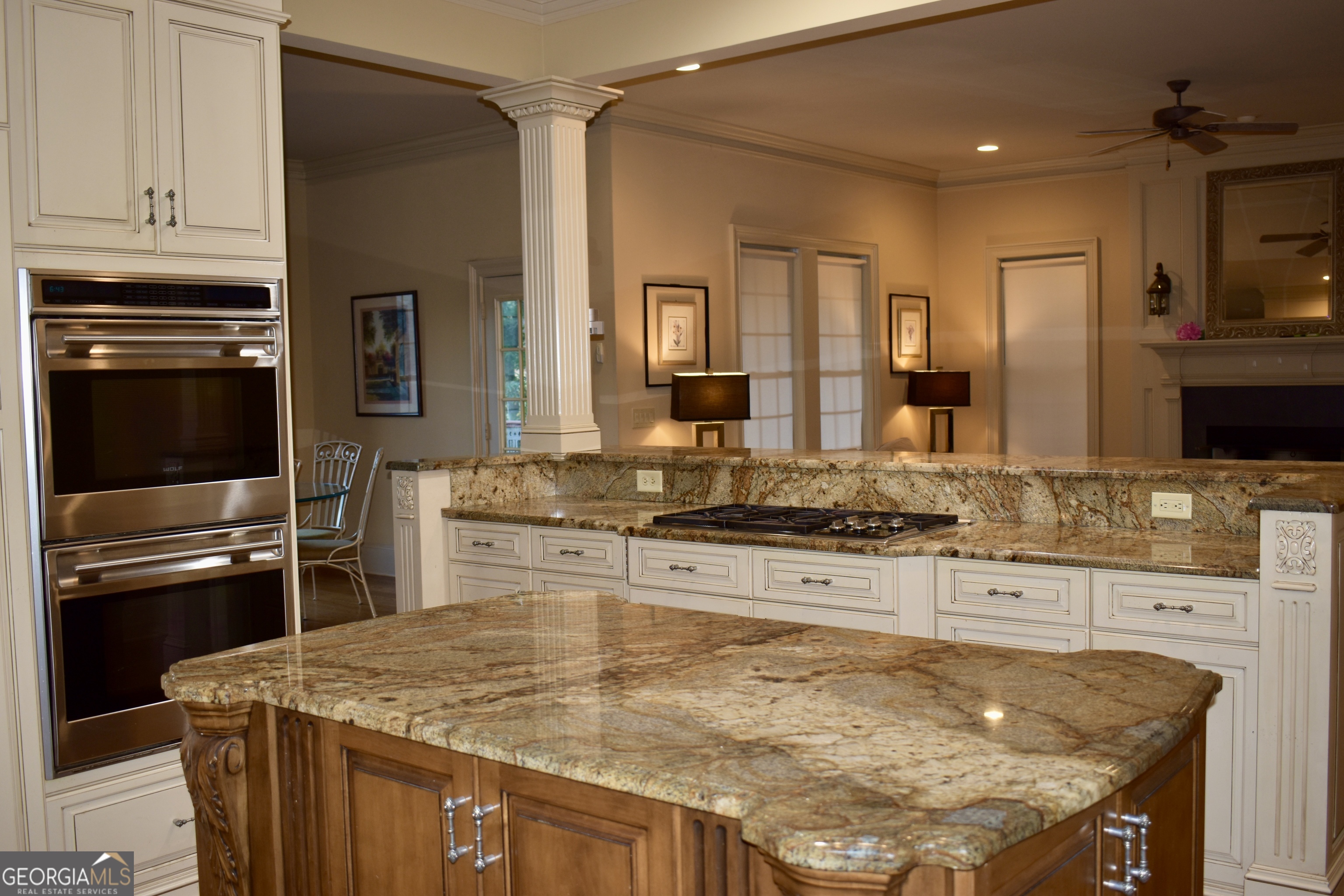 3 Club Drive Newnan, GA 30263 - Photo 27 of 43 a kitchen with kitchen island granite countertop a sink stove and refrigerator