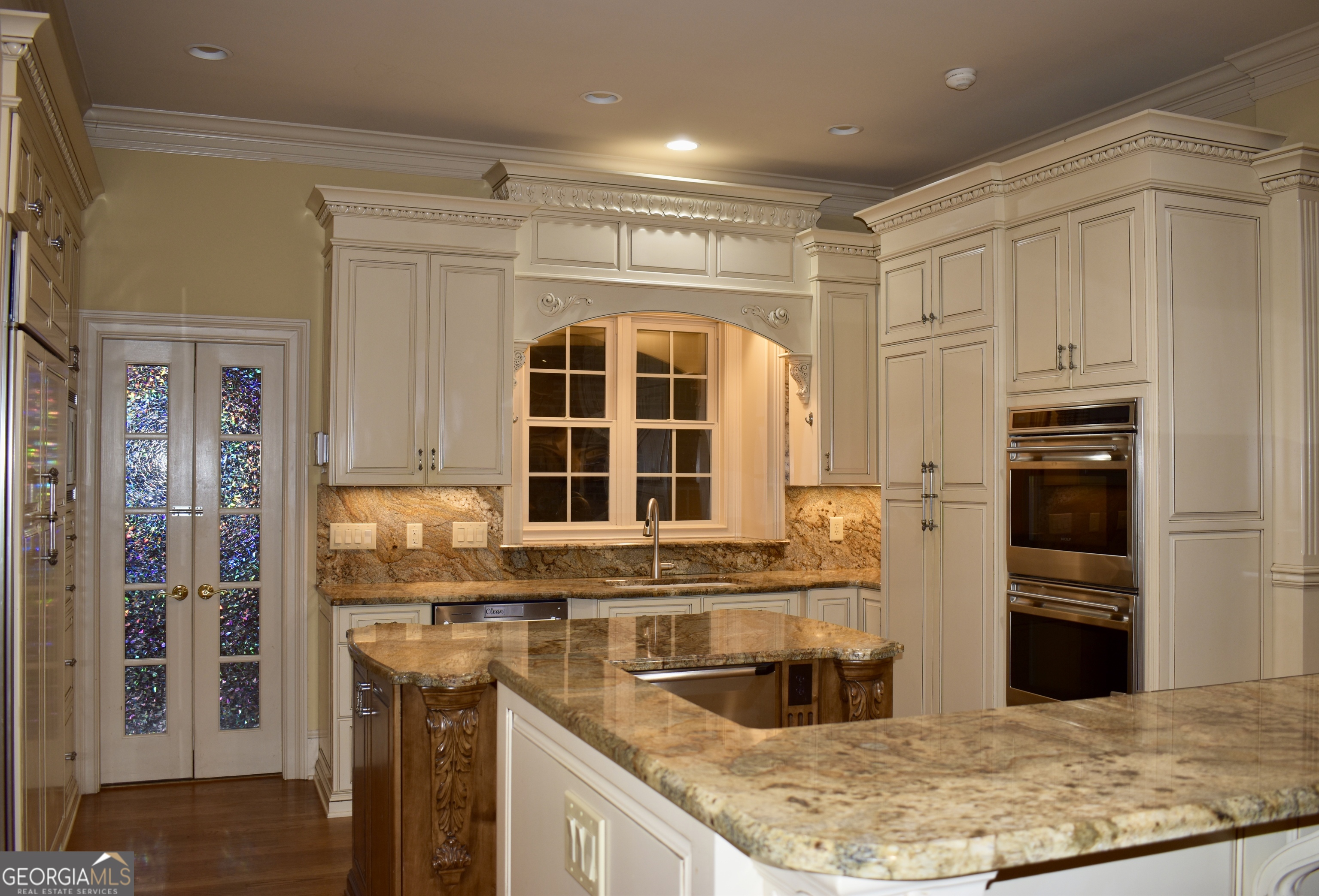 3 Club Drive Newnan, GA 30263 - Photo 28 of 43 a kitchen with stainless steel appliances granite countertop a sink stove and refrigerator