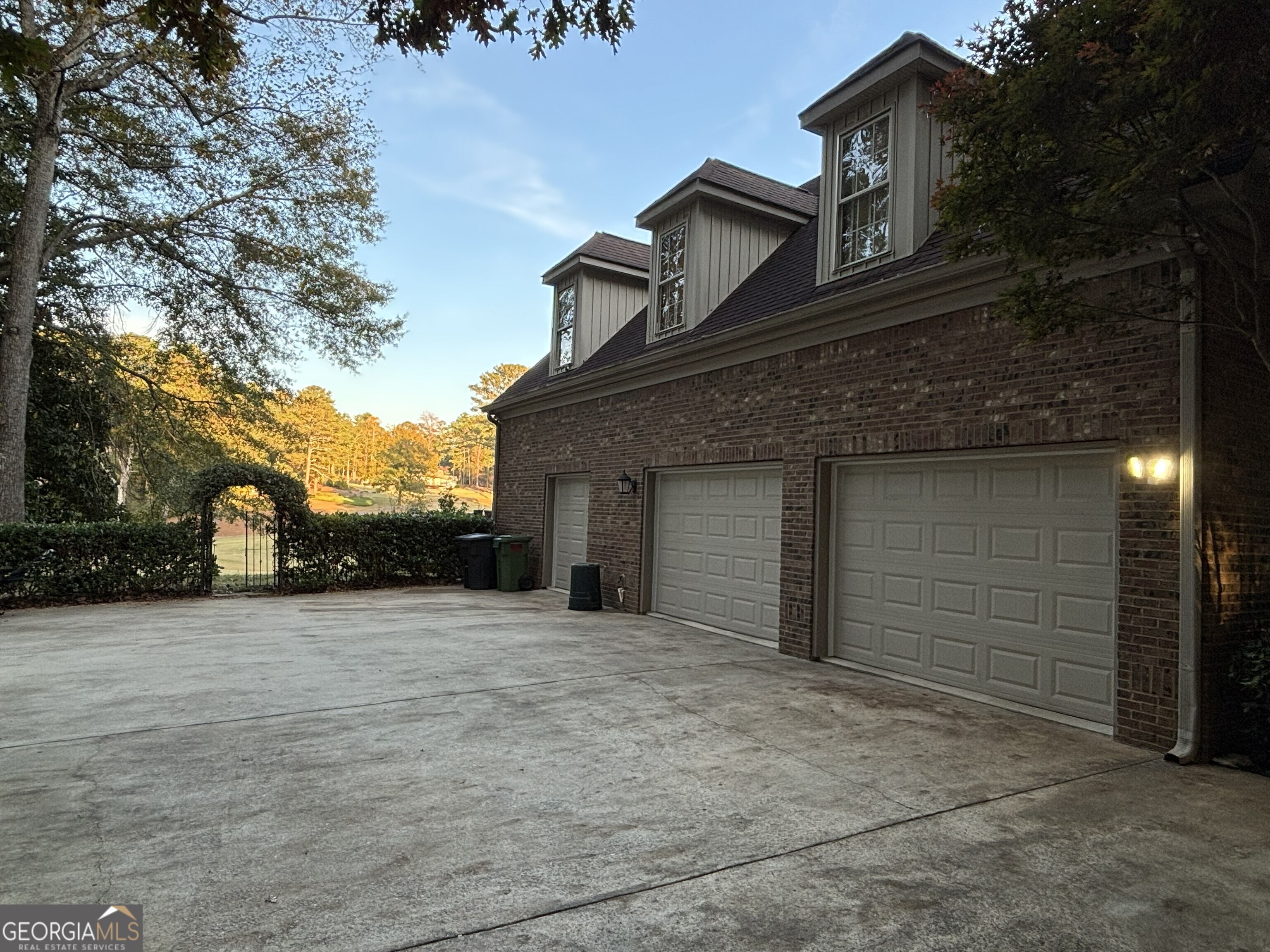 3 Club Drive Newnan, GA 30263 - Photo 5 of 43 front view of a house with a small yard