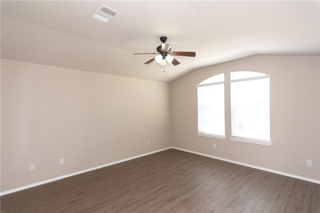 2605 Summerwalk Place Round Rock, TX 78665 - Photo 18 of 37 wooden floor in an empty room with a window