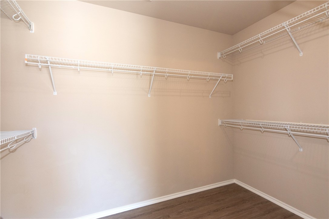2605 Summerwalk Place Round Rock, TX 78665 - Photo 22 of 37 a view of a room with racks on the wall