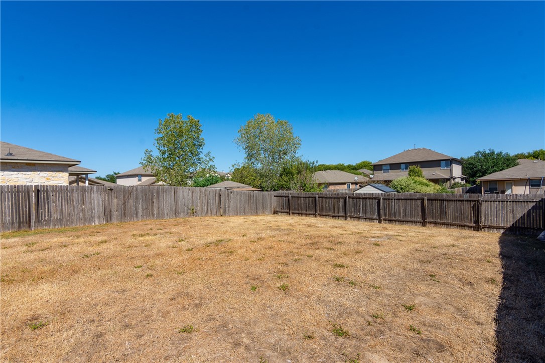 2605 Summerwalk Place Round Rock, TX 78665 - Photo 37 of 37 a view of a backyard of a house
